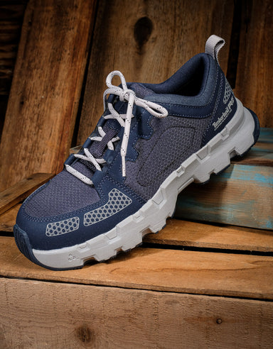 profile view of navy blue timberland pro tennis shoe