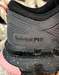 Close-up of a Timberland Pro safety shoe with a focus on the sole and brand logo.