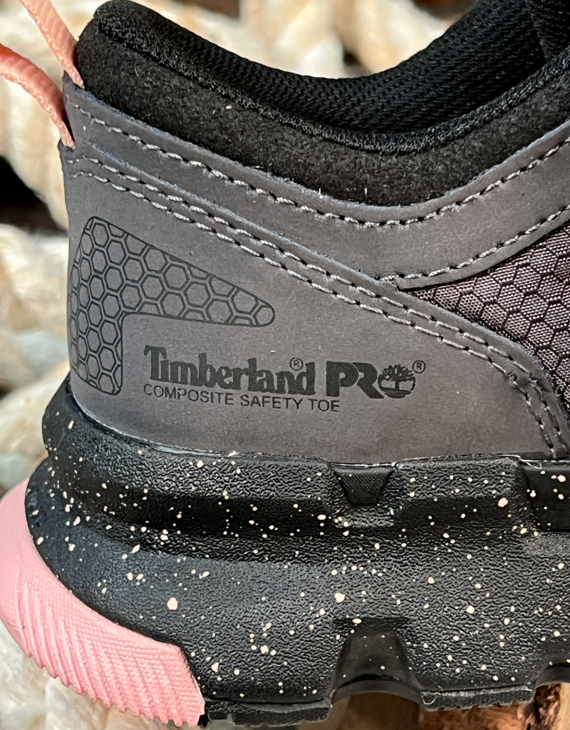 Close-up of a Timberland Pro safety shoe with a focus on the sole and brand logo.