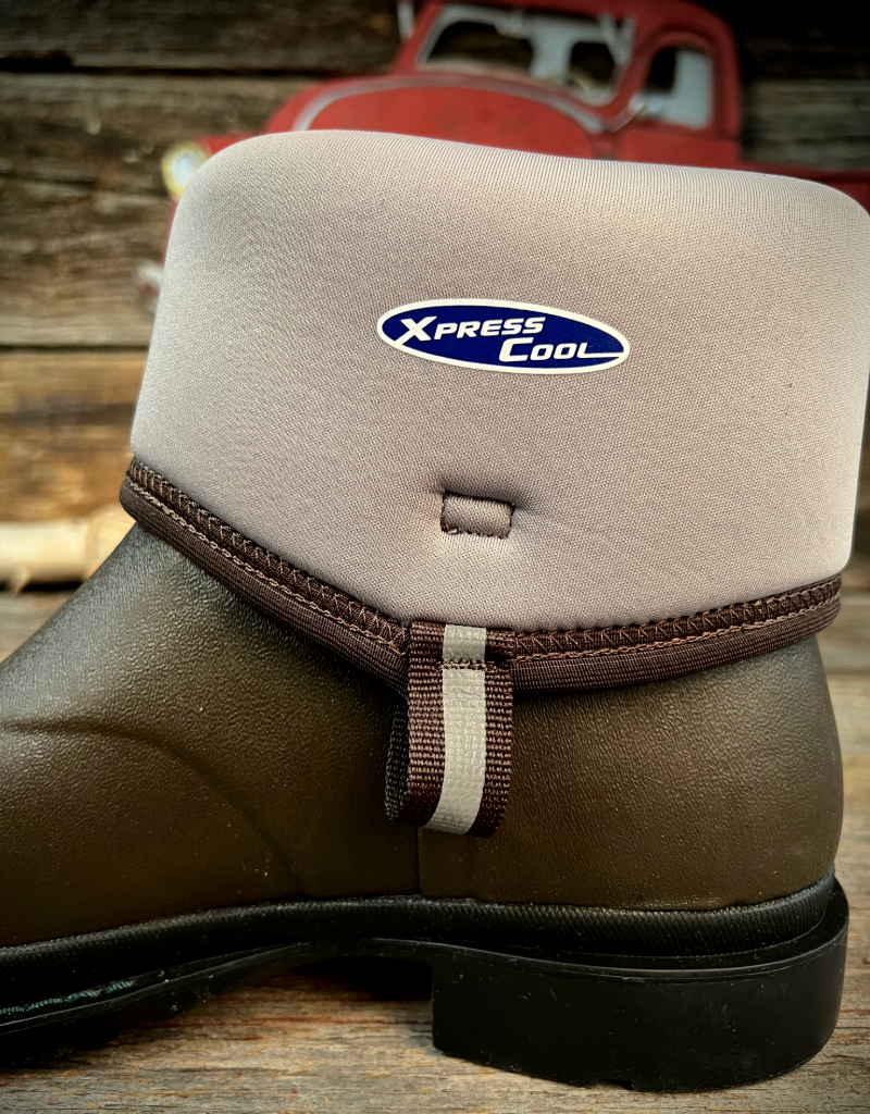 Brown boot with a beige lining, featuring the Xpress Cool logo, on a wooden surface.