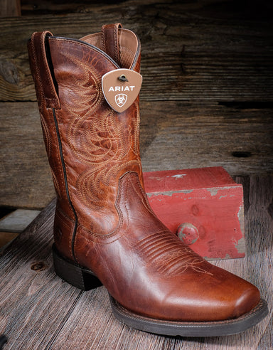 A single brown boot with an Ariat tab on the top