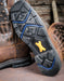 Close up on Ariat black rubber sole that features the words Oil resistant and slip resistant 