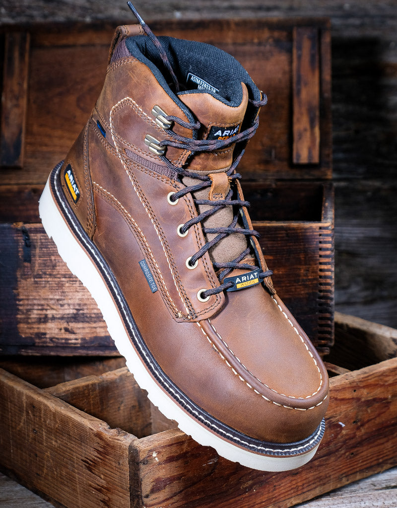 Brown leather boot with white sole on a wooden background
