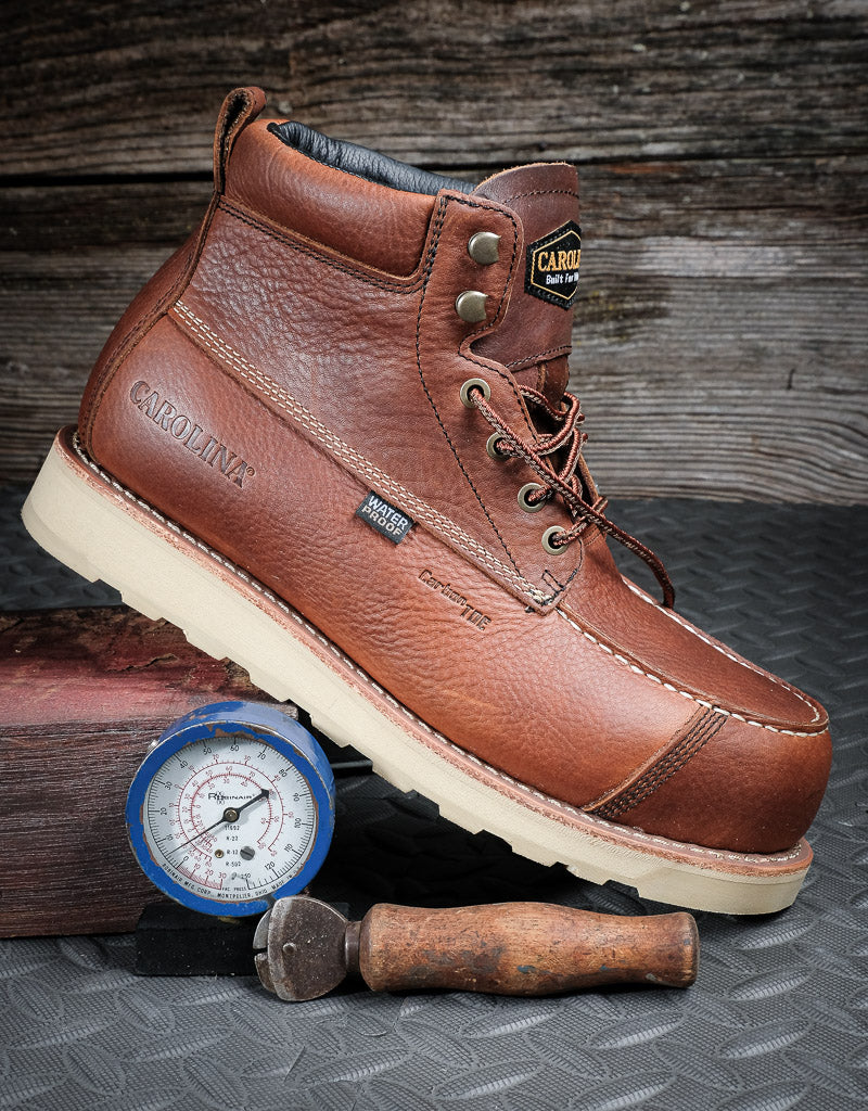 Side view of 6" rich brown boot with an off white wedge sole