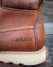 Close up of Carolina insignia stamped on the side of the leather heel