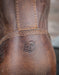 closeup on 'EH' stamped onto the heel of the boot