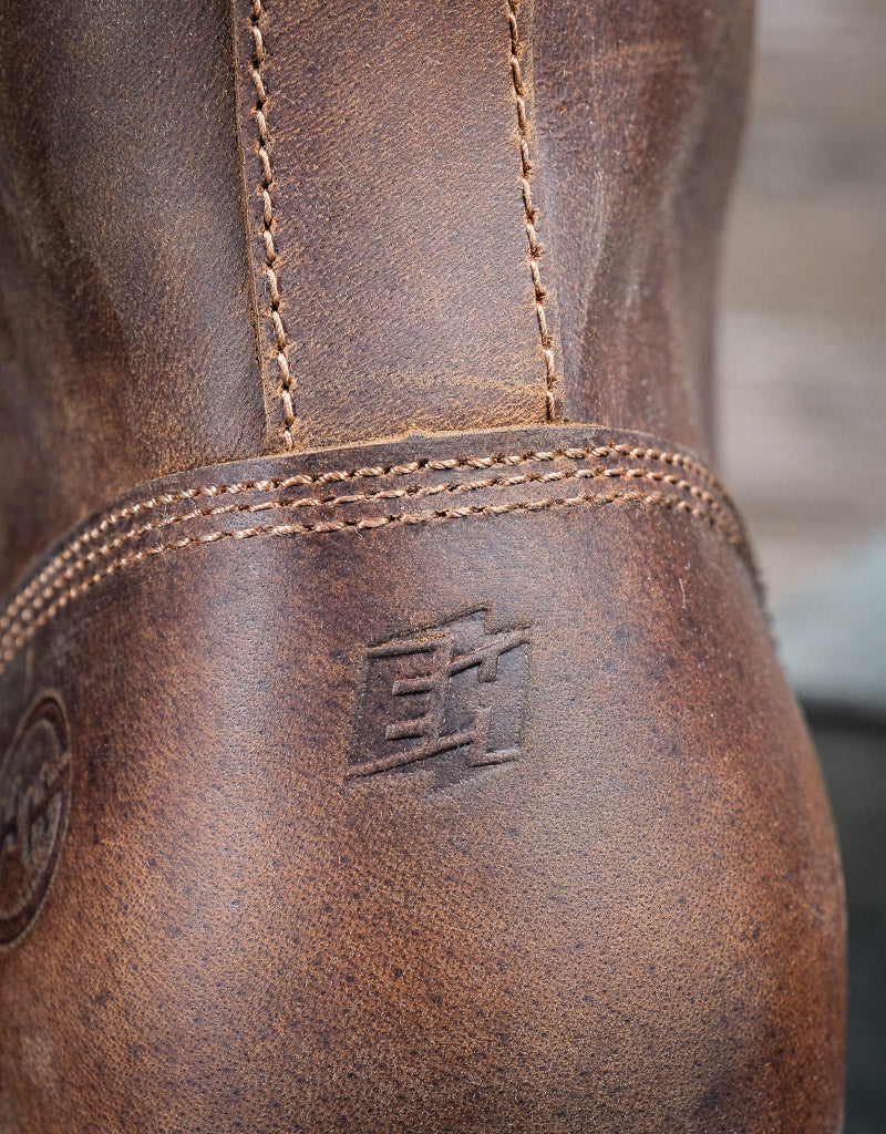 closeup on 'EH' stamped onto the heel of the boot