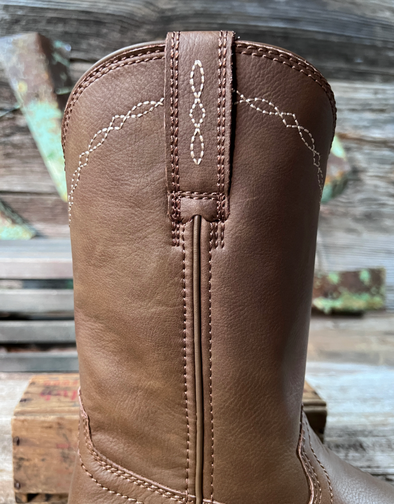 Brown leather boot with intricate stitching on a wooden surface