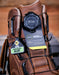 Brown work boot with BOA system and safety certification label on a blurred background