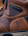 Close-up of a brown leather boot with 'Georgia Boot' logo and waterproof label.