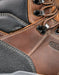Close-up of a brown leather boot with KeenDry technology label