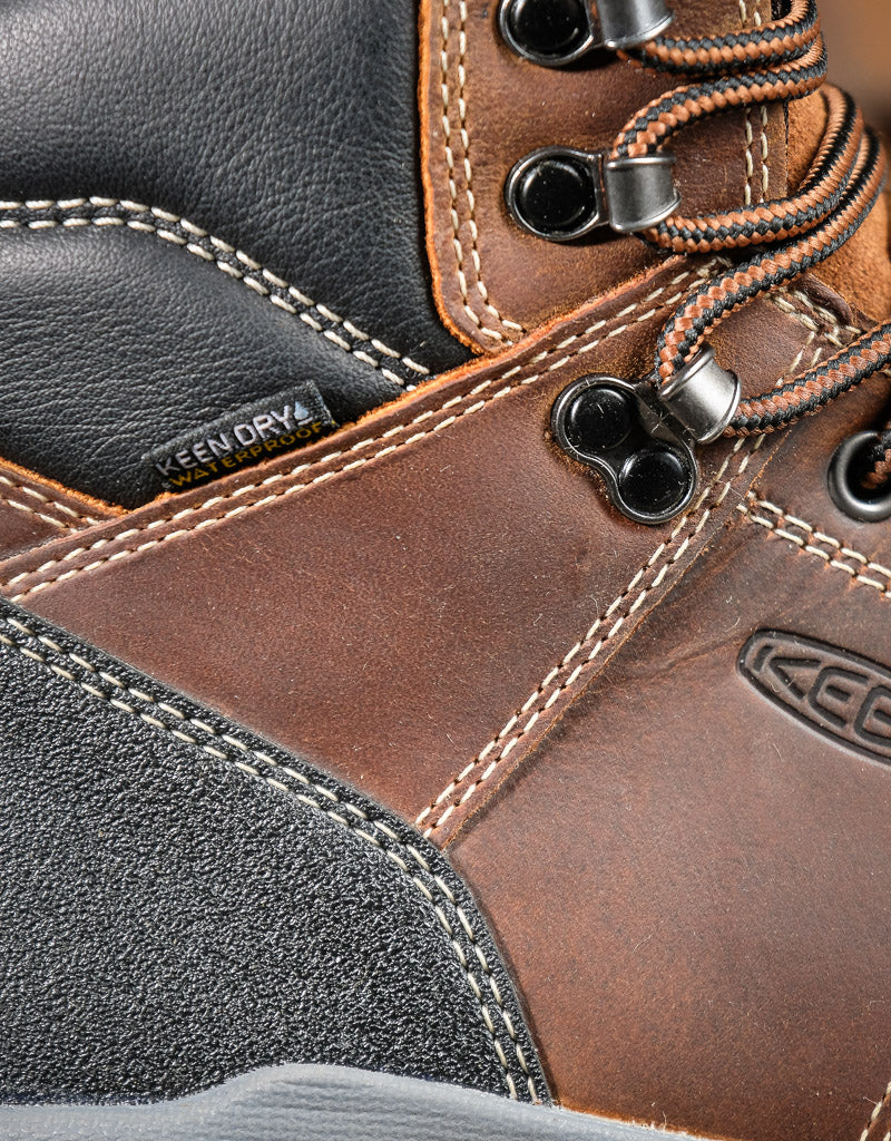 Close-up of a brown leather boot with KeenDry technology label