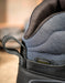 Close-up of a KEEN boot with 'KeenDry' and 'Waterproof' labels on a blurred background