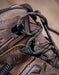 Close-up of brown hiking boots with laces on a blurred background