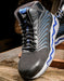 single black and blue Reebok shoe 
