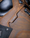 Close-up of a brown leather boot with stitching details and a Waterproof label.
