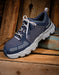 profile view of navy blue timberland pro tennis shoe