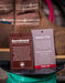 Brown leather boot with BarnShield and Nano Toe labels on a blurred background