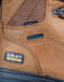 closeup on Carbon toe and waterproof tag beside Ariat Work Emblem